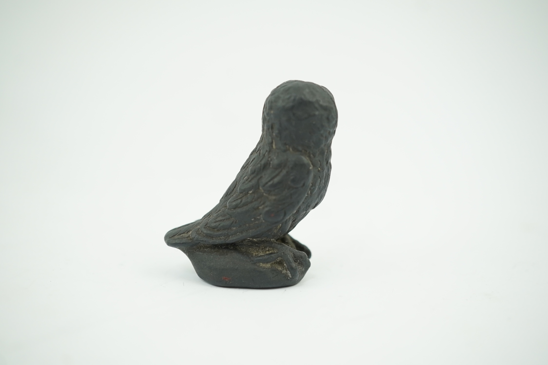 Attributed to Wedgwood, a black basalt intaglio fob seal, c.1809, modelled as an owl, inscribed ‘For further Particulars Enquire Within, 3.5cm high. Condition - good